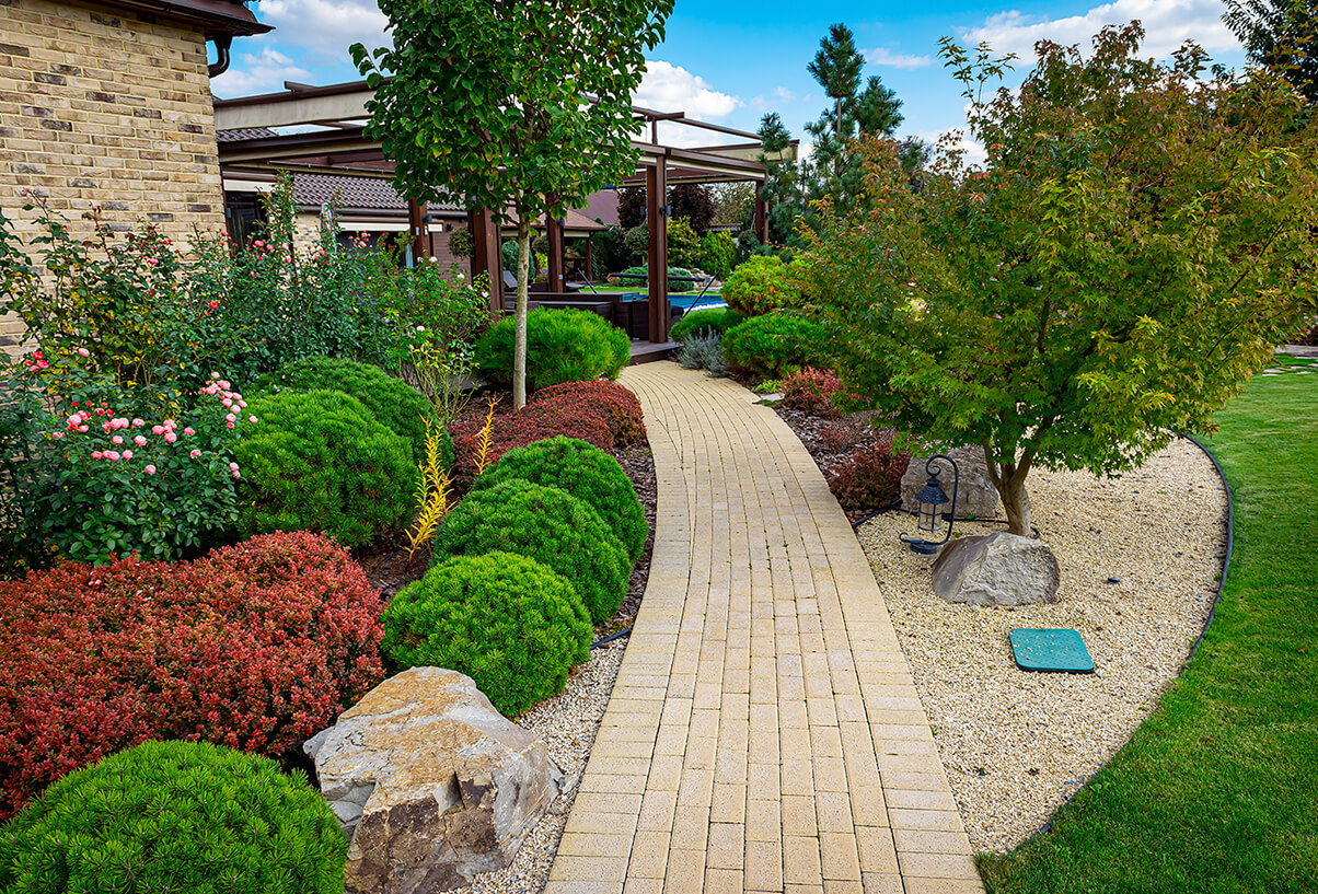Garden with brick path and warm colors