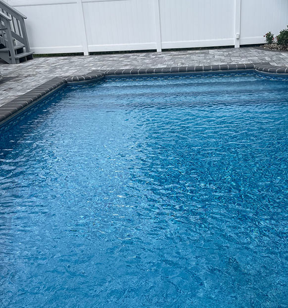 Big, blue pool in backyard